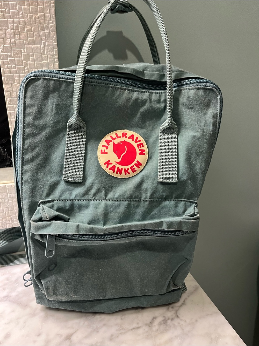Fjallraven Kanken Backpack in Deep Green with Red Logo